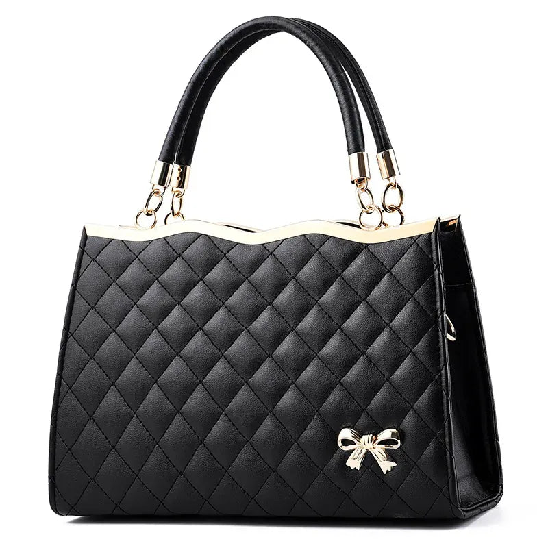 Elegant Quilted Red Top-Handle Handbag with Gold Bow Accent